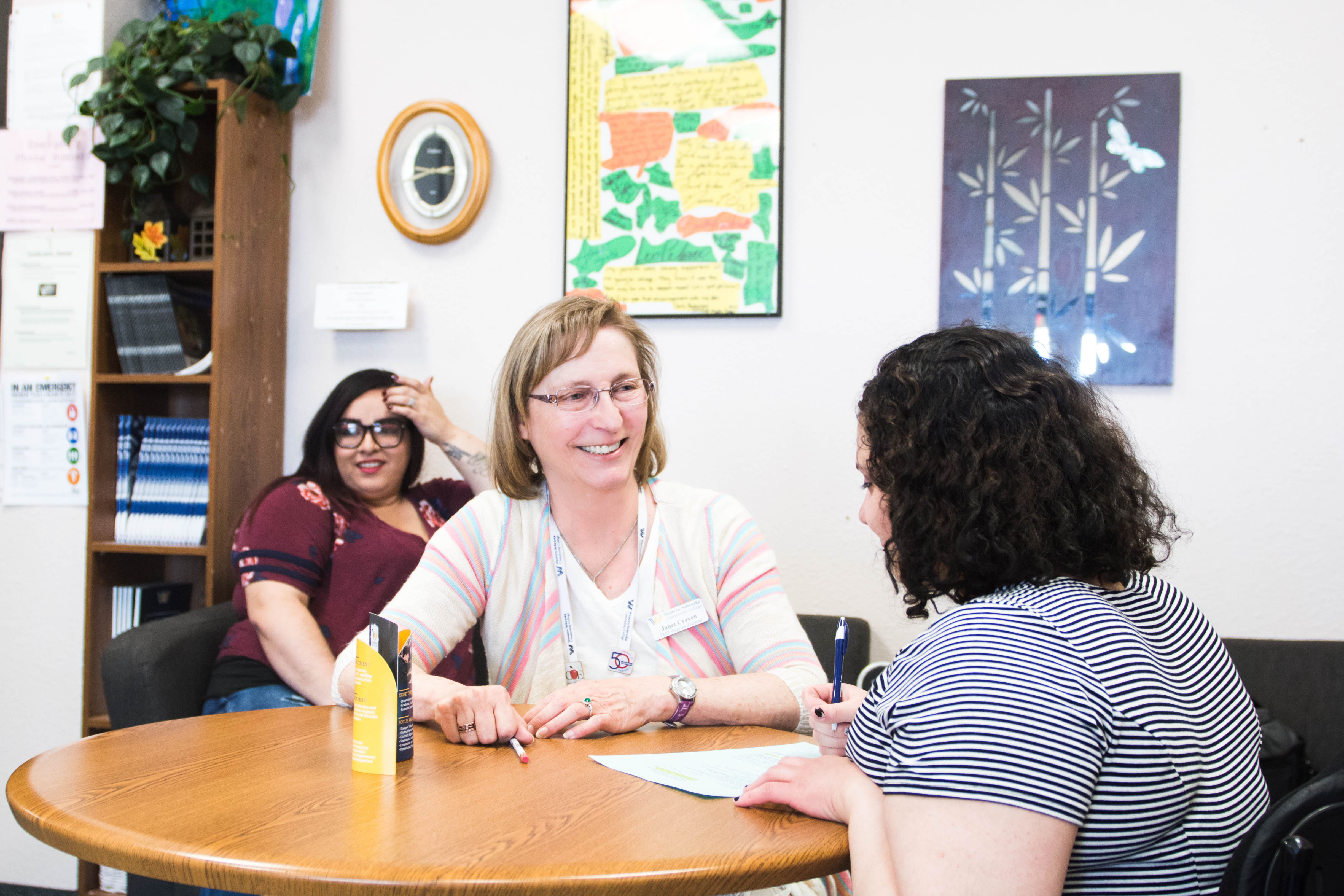 Trio student working with an advisor